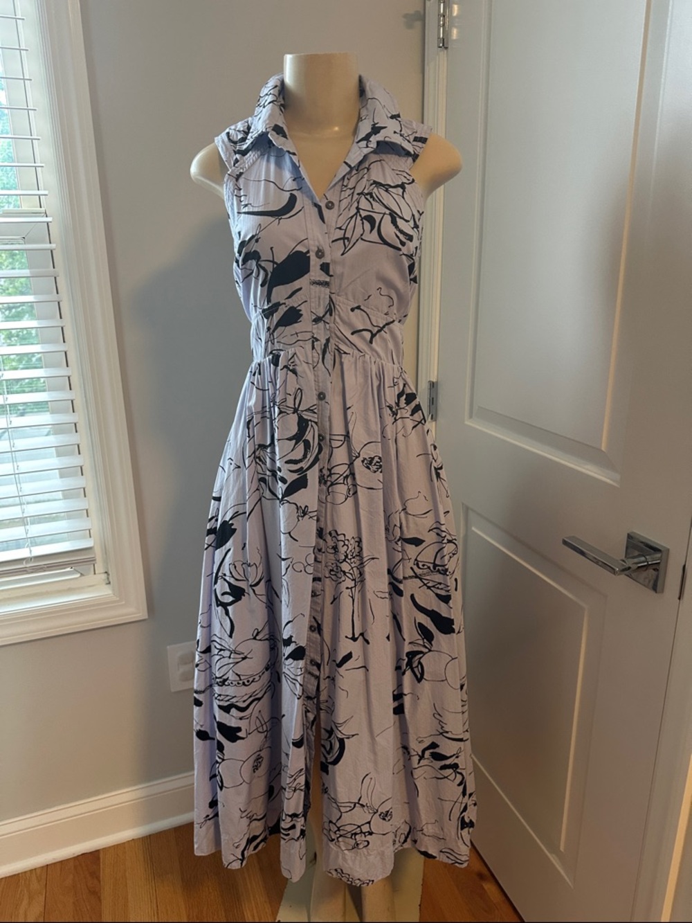 Sleeveless Light Blue Floral Button-Front Midi Dress with pockets